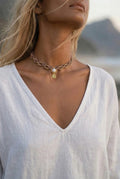 WILD – Handgemaakte bruine ketting met howlietsteen